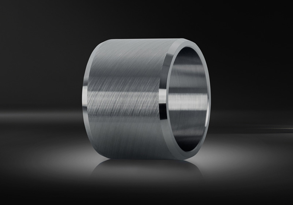 Shaft sleeve for compressor applications